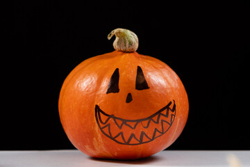 Halloween pumpkin on a black background. Halloween Sale