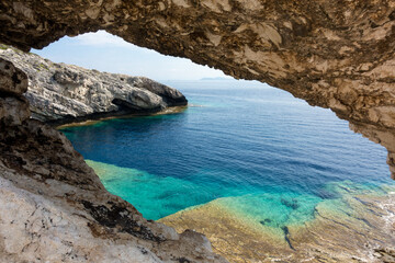 Amazing rocky formations and gorgeous sea waters of the south coastline in Othonoi island, Greece