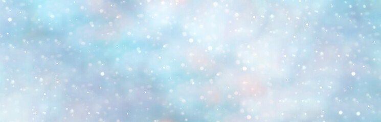 Winter blurred background with snow decorated with garland lights, holiday festive background