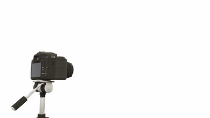 3D rendering of a camera on a tripod with a plain white background. Suitable to place on content with that theme.
