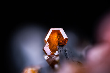 Orange vanadinite photography on black background. Specimen from Mibladen, Morocco. macro detail...