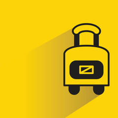 luggage icon with shadow on yellow background