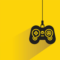 game joystick icon with shadow on yellow background