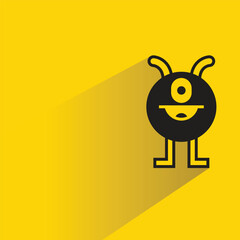 cartoon monster icon with shadow on yellow background