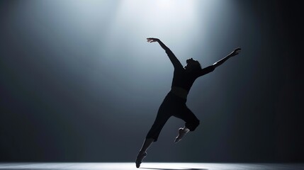 Dynamic Solo Dancer in a Dramatic Studio Spotlight with Expressive Movements