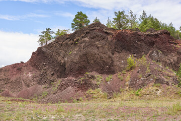 Extinct volcano with rock formations and vegetation