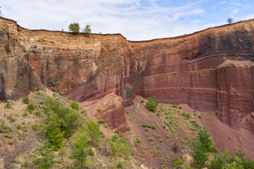 Extinct volcano with rock formations and vegetation
