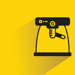 coffee machine icon with shadow on yellow background