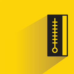 thermometer icon with shadow on yellow background