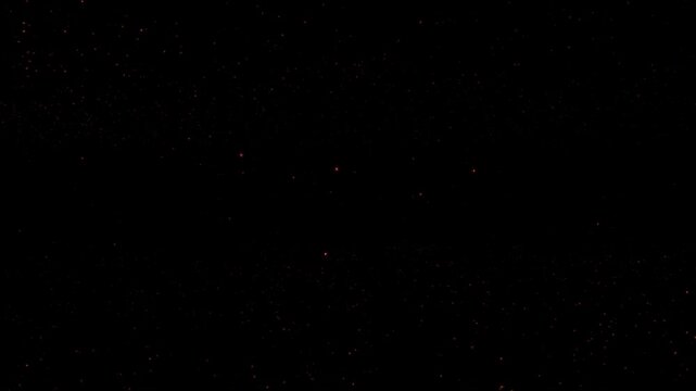 Abstract loop animation glow pink red star dust particles flow on black background. 4K 3D seamless looping orange gold bokeh particles dust fly in the air.
