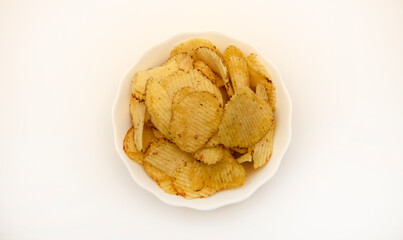 A cup of chips. Potato chips on a white background.