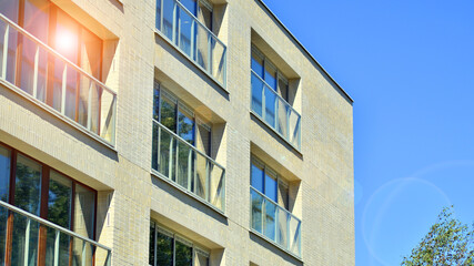 Fototapeta premium New apartment building. Residential area with modern apartment building.