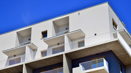 Fototapeta premium New apartment building. Residential area with modern apartment building.