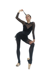 young ballerina in a black leotard shows an eversion of the foot and plastic surgery, holding on to the braid, hanged, young ballerina in a black leotard shows the eversion of her feet with her hands 