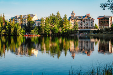 Fototapeta premium Mountain lake Strbske pleso. Strbske lake with view of the High Tatras National Park, Slovakia