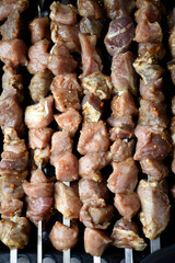 Raw pickled pork meat. Prepared for frying shish kebab.