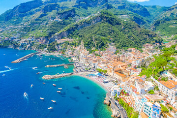 Amalfi on Amalfi Coast, Italy. Aerial photo of famous city Amalfi located on Amalfi Coast with blue sea water and beautiful colorful houses on the cliff