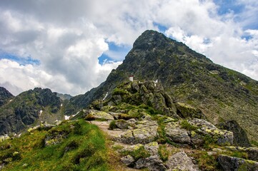 Magical hiking in the Polish Tatras. Tatra Mountain view to group of glacial lakes from path Kasprowy Wierch and to Swinica mount, Poland. 