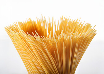 Uncooked Spaghetti Bunch on White Background