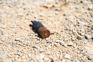 Used shotgun hunting rifle bullet. Hunting cartridge. Bullet casing. Ammunition. Hunting rifle bullet. 