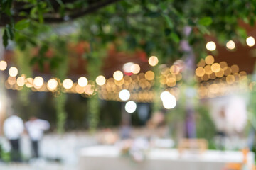 Blurred outdoor wedding reception celebration party at hotel