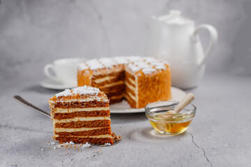 Homemade Russian layered honey cake sliced.