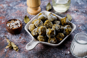 Dolma - stuffed grape leaves with rice and meat.
