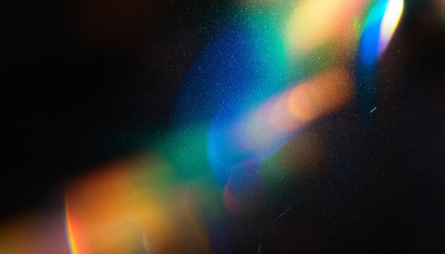 Abstract Light Refraction on Black Background. Spectrum of Rainbow Colors Blurred by Lens Flare, Featuring Vibrant Red, Orange, Green, and Blue Hues in a Soft, Ethereal Glow