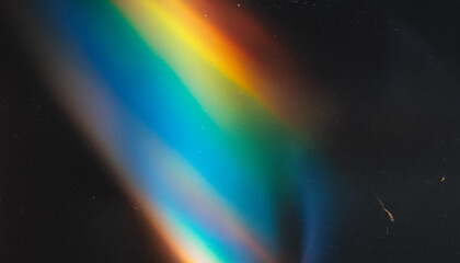 Abstract Light Refraction on Black Background. Spectrum of Rainbow Colors Blurred by Lens Flare, Featuring Vibrant Red, Orange, Green, and Blue Hues in a Soft, Ethereal Glow