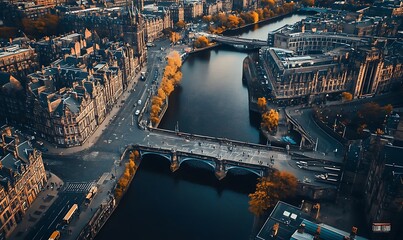 Aerial View of City Featuring River, Modern Bridges, and Historic Architecture