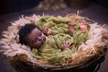 Sweet African baby in Christmas Nativity scene