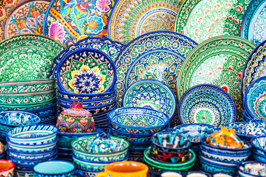 Multicolored ceramic dishes with oriental ornaments at the Siab Bazaar.