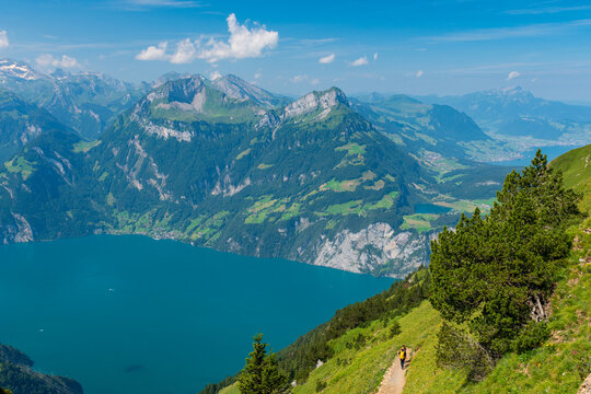 The Stoos hike in summer offers breathtaking views of the Swiss Alps, lush green meadows, and serene lakes. The trail is accessible yet challenging, with panoramic vistas that make every step rewardin