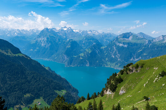 The Stoos hike in summer offers breathtaking views of the Swiss Alps, lush green meadows, and serene lakes. The trail is accessible yet challenging, with panoramic vistas that make every step rewardin