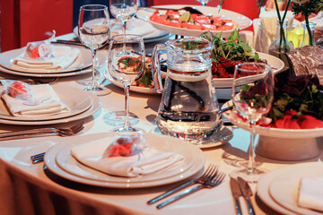 Beautifully served table with delicacies in a restaurant. Close-up, selective focus.