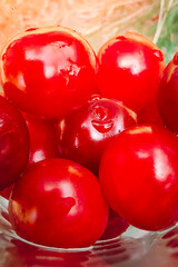 Cherry berries close-up. Wet sweet ripe cherries. Background. Dark red cherries covered with fine splashes of water. Summer berries.