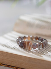 Handmade bracelet with energy crystals and healing stones. Selective focus