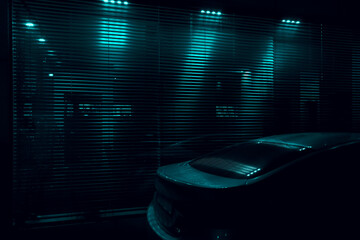 hallway with blinds jalousie louvers on window frame office and electrical light coming through....