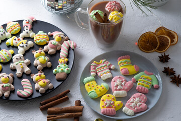 Christmas marshmallows. Winter candy. Sweet food for ugly sweater party in december