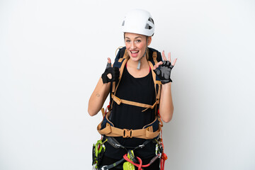 Young caucasian rock climber woman isolated on white background showing ok sign and thumb up gesture