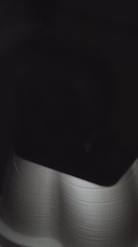 The model object printed on the 3d printer is inside the 3d printer close-up. Progressive modern additive technologies. Universal 3D printer for home and education.