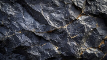 Black stone, showcasing its texture, natural imperfections, and rich color