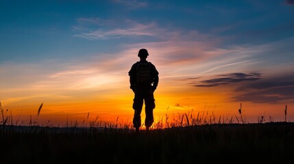 Silhouette of soldier at dawn embodies strength and readiness to confront daily challenges