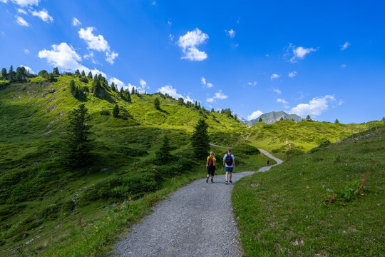 Couple walking on the Hochtannberg, State of Vorarlberg, Austria