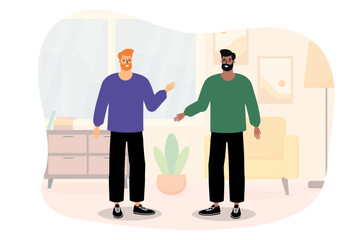 Two men engaging in a friendly conversation in a cozy living room with modern decor during daytime