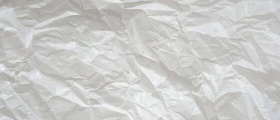 Creative background with scattered overlay of crumpled papers.