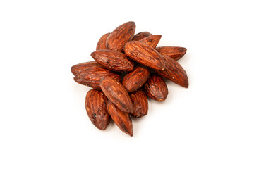 A group of caramelized almonds isolated on a white background.