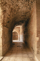 Obraz premium Durres,Albania, August 7,2024:inside the amphitheater of the city of Durres, the largest Roman amphitheater in the Balkans