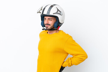 Young caucasian man with a motorcycle helmet isolated on white background suffering from backache for having made an effort