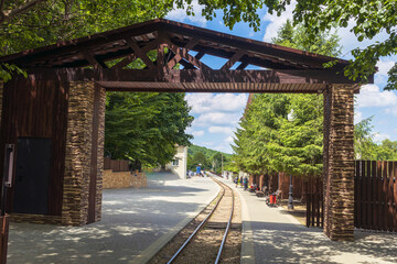 A narrow-gauge excursion railway, a steam locomotive takes tourists to the Guam Gorge. Tourism, recreation in the mountains.